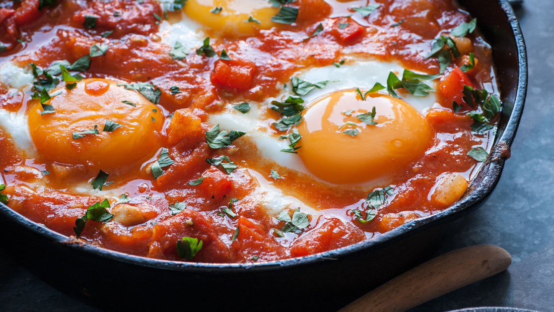Baked Eggs and Greens in Harissa Tomato Sauce