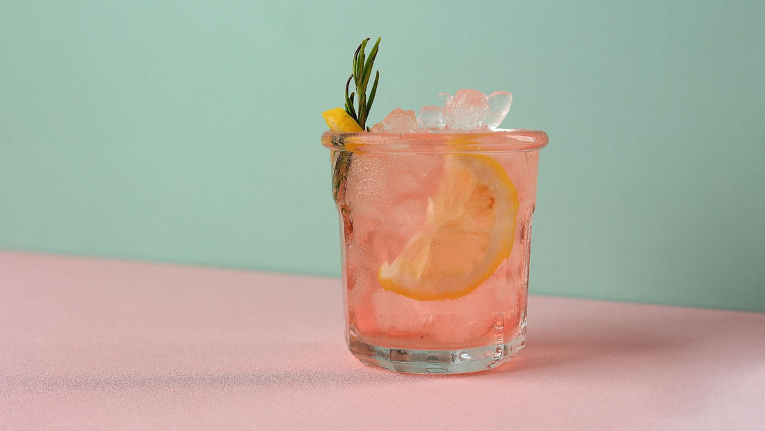 Smoky Mezcal Paloma with Aleppo Pepper Rim